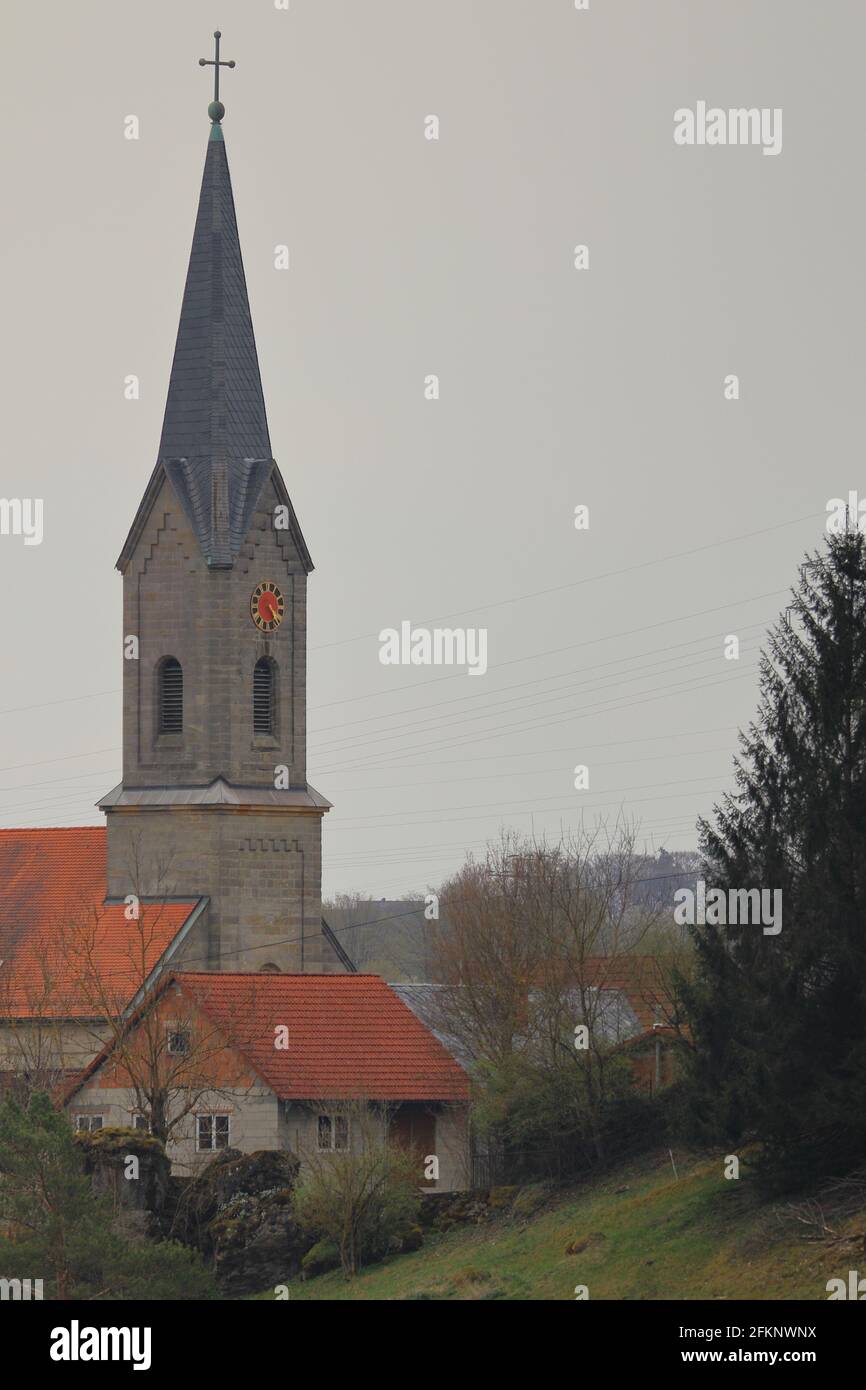 view of a church in a village of upper franconia Stock Photo