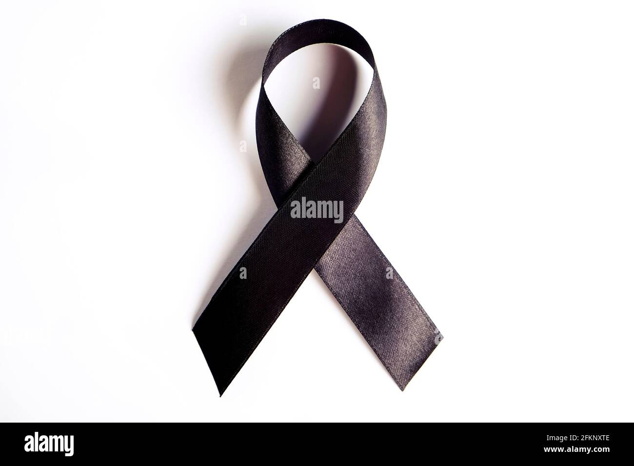 Black ribbon - sign of POW/MIA remembrance and mourning, melanoma awareness, sleep disorders and gang prevention symbol. Isolated on white background, Stock Photo