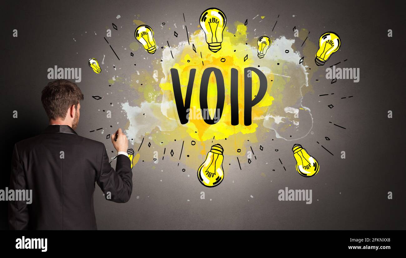man drawing colorful light bulb Stock Photo