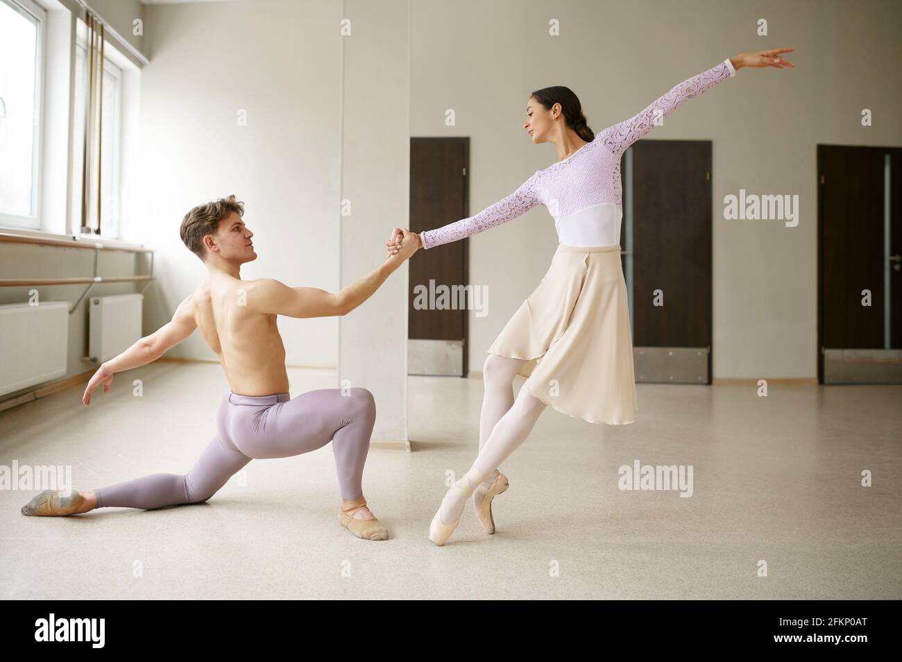 Couple of ballet dancers, performance in action Stock Photo