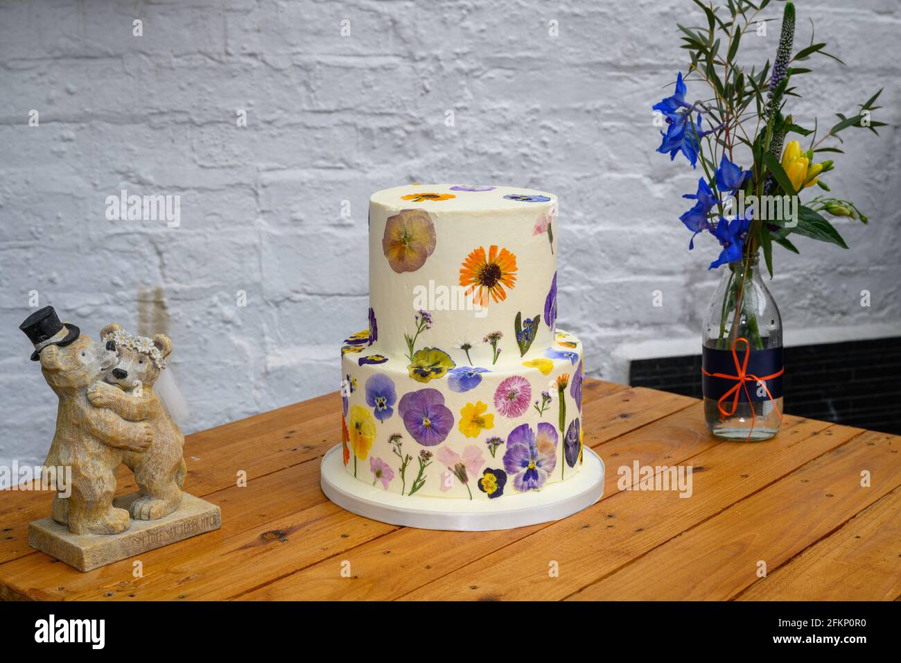 Wedding cake with pressed flower design Stock Photo