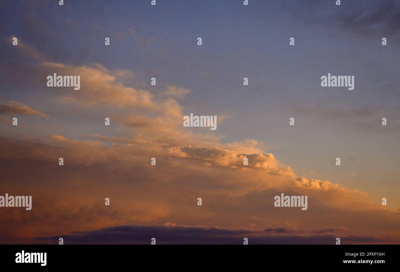 Beautiful colorful sunset sky with clouds and sunlight Stock Photo - Alamy