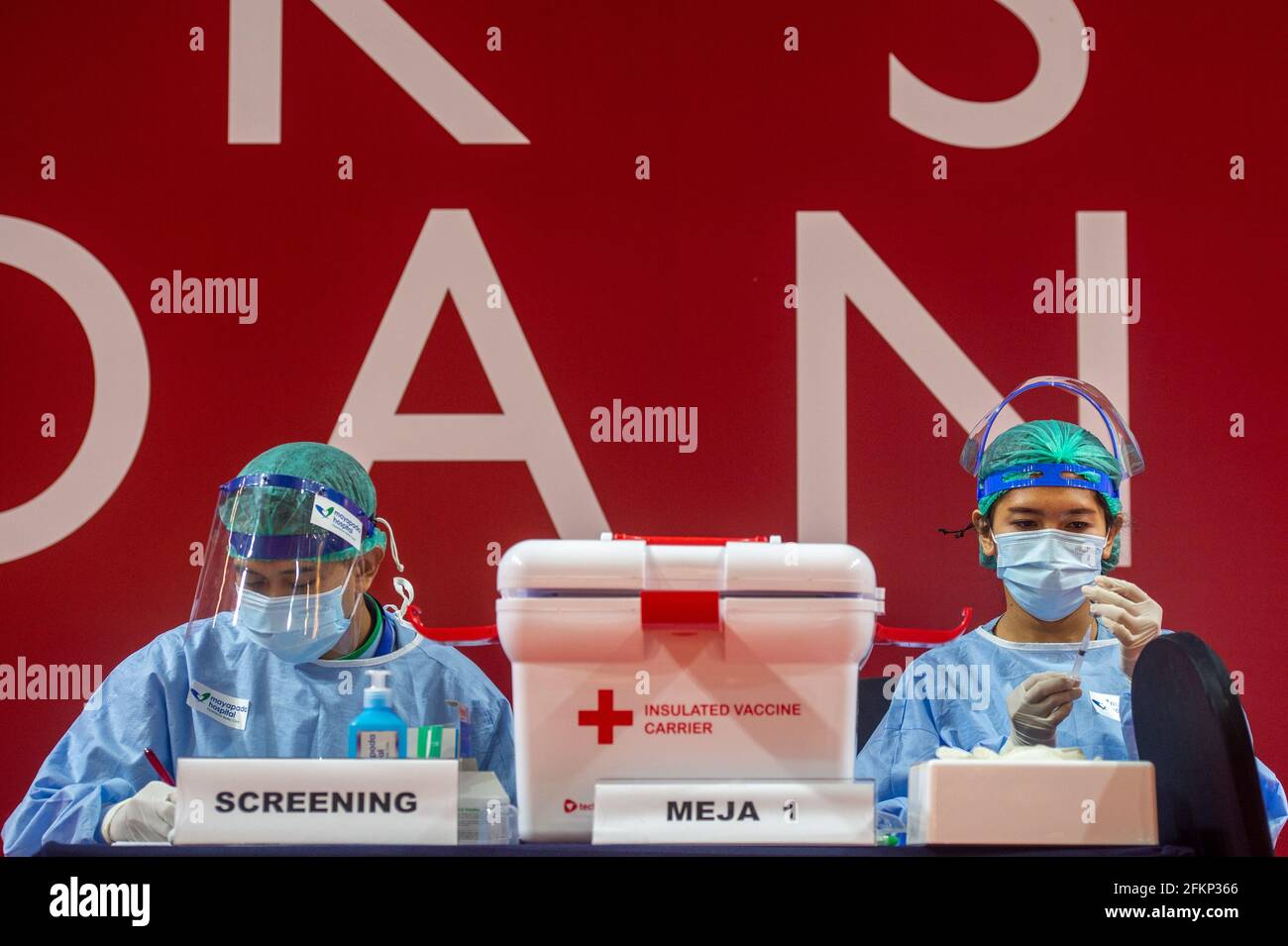 Jakarta, Indonesia. 3rd May, 2021. Medical workers prepare to get people inoculated with COVID-19 vaccines in Jakarta, Indonesia, May 3, 2021. Credit: Veri Sanovri/Xinhua/Alamy Live News Stock Photo