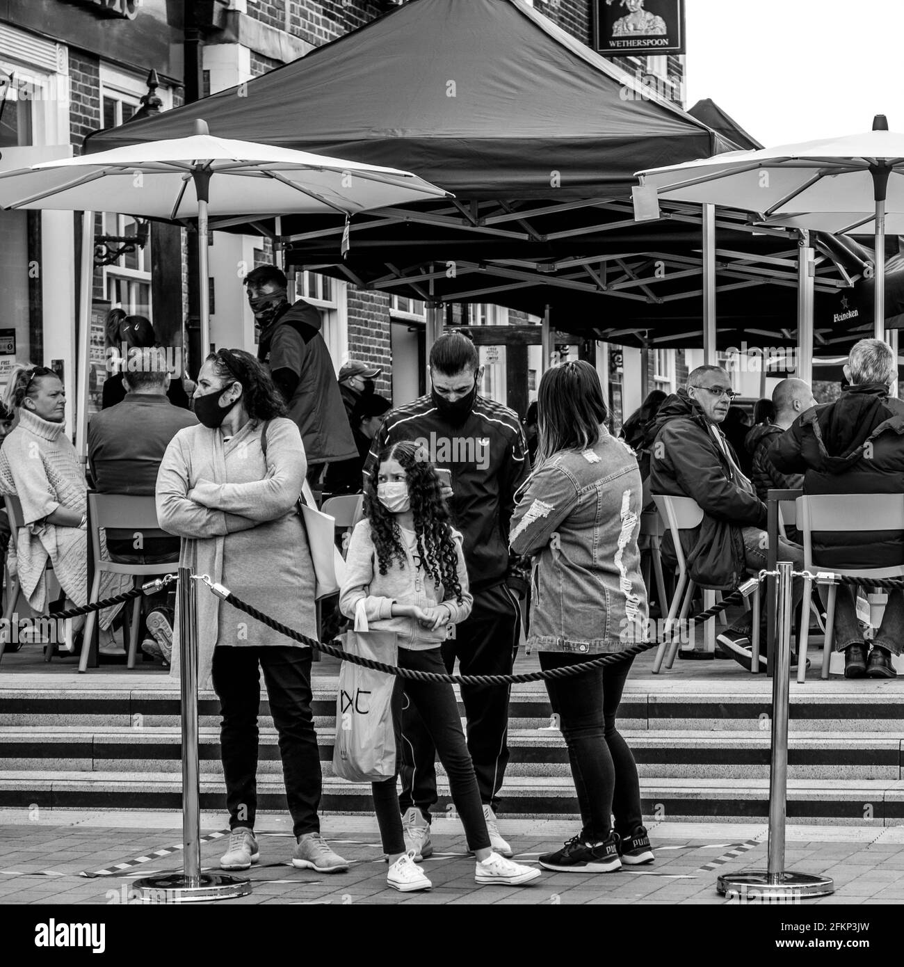 Epsom Surrey London UK, May 02 2021, Group Of People Sitting Ouside A Wetherspoons Pub Drinking On A Terrace Stock Photo