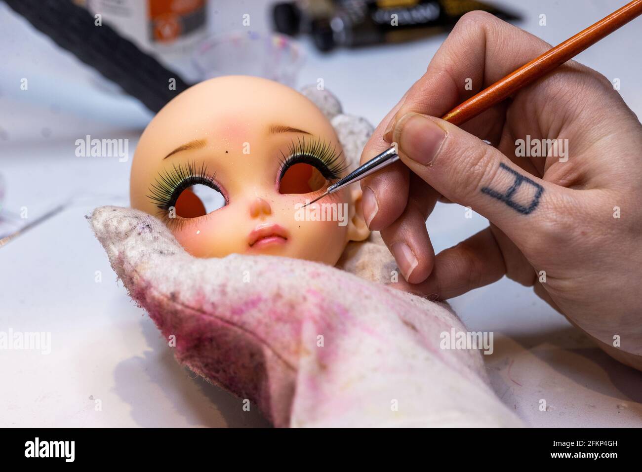 Strasburg Germany 29th Apr 21 Fashion Designer Elisa Lange Paints The Manga Doll Lylla She Designed In The Workshop The 32 Year Old Broadcasts Her Work On The Internet And Now Supplies Customers All