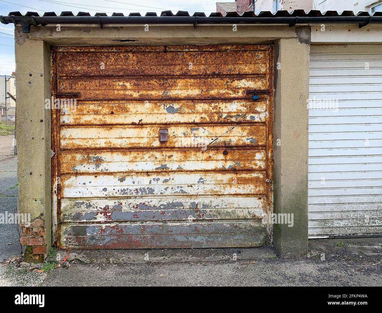 Damaged Garage Door High Resolution Stock Photography And Images Alamy