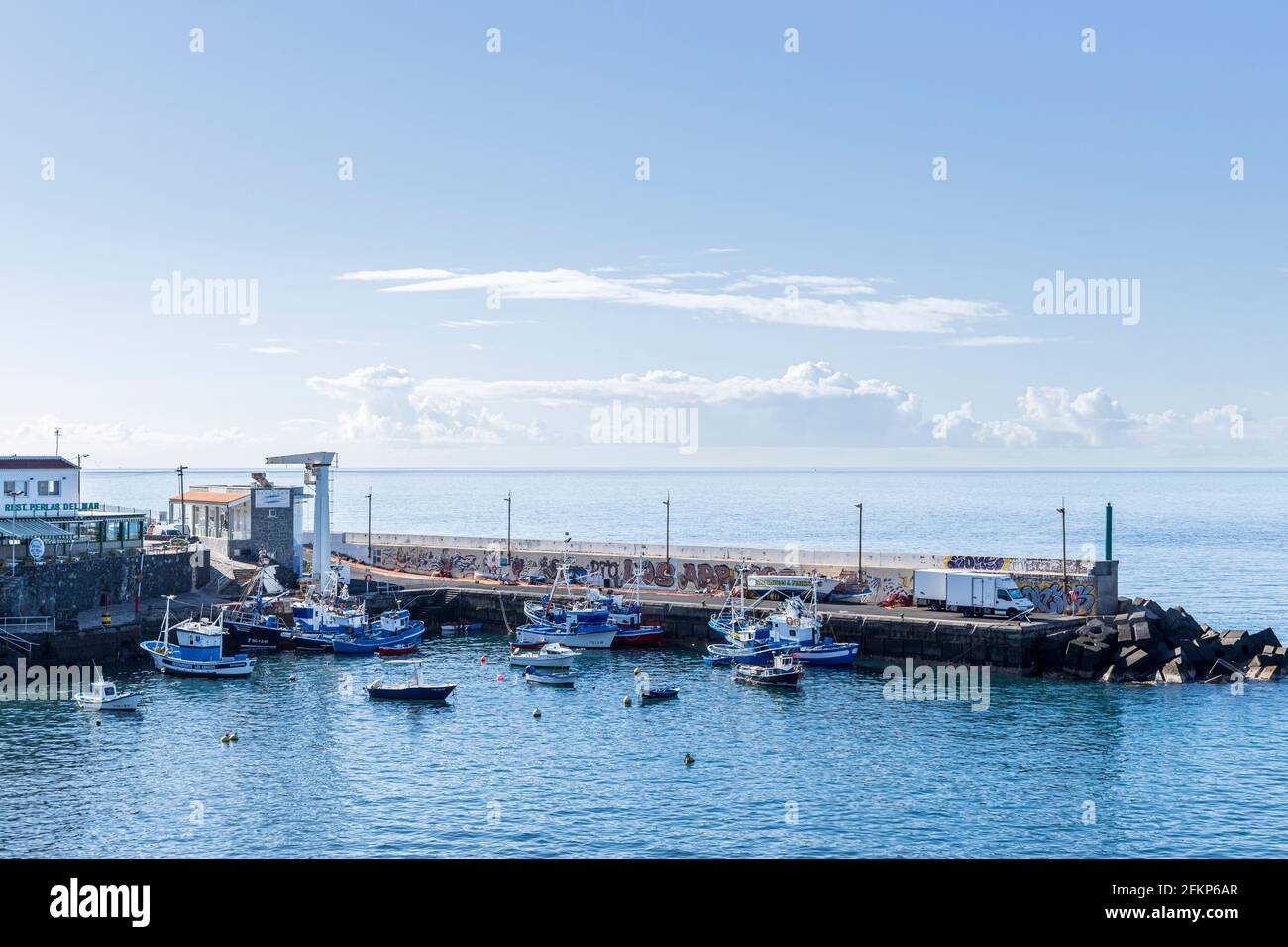 The port, harbour with fishing boats moored in Los Abrigos, Tenerife, Canary Islands, Spain Stock Photo