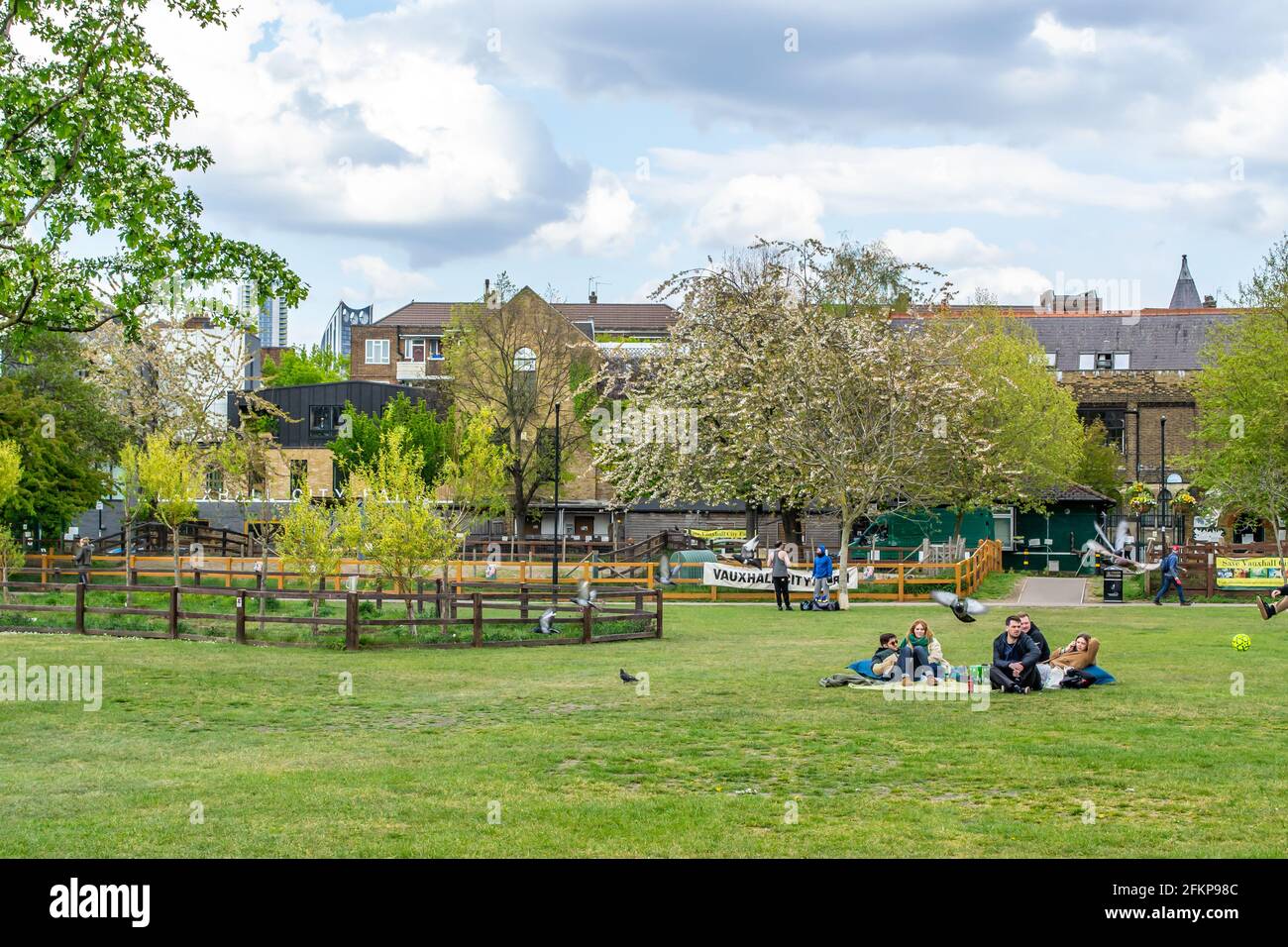 VAUXHALL, LONDON, ENGLAND- 1 May 2021: Vauxhall City Farm photographed from the grass of Vauxhall Pleasure Gardens Stock Photo