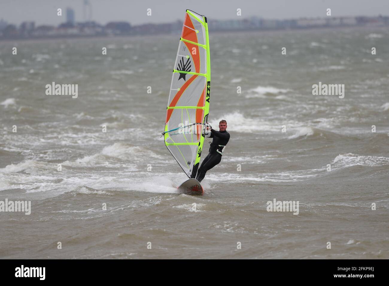 New Forest, Hampshire. 3rd May 2021. UK Weather.  Strong winds at Calshot Beach in the New Forest with gusts up to 40 mph. Credit Stuart Martin/Alamy Live News Stock Photo