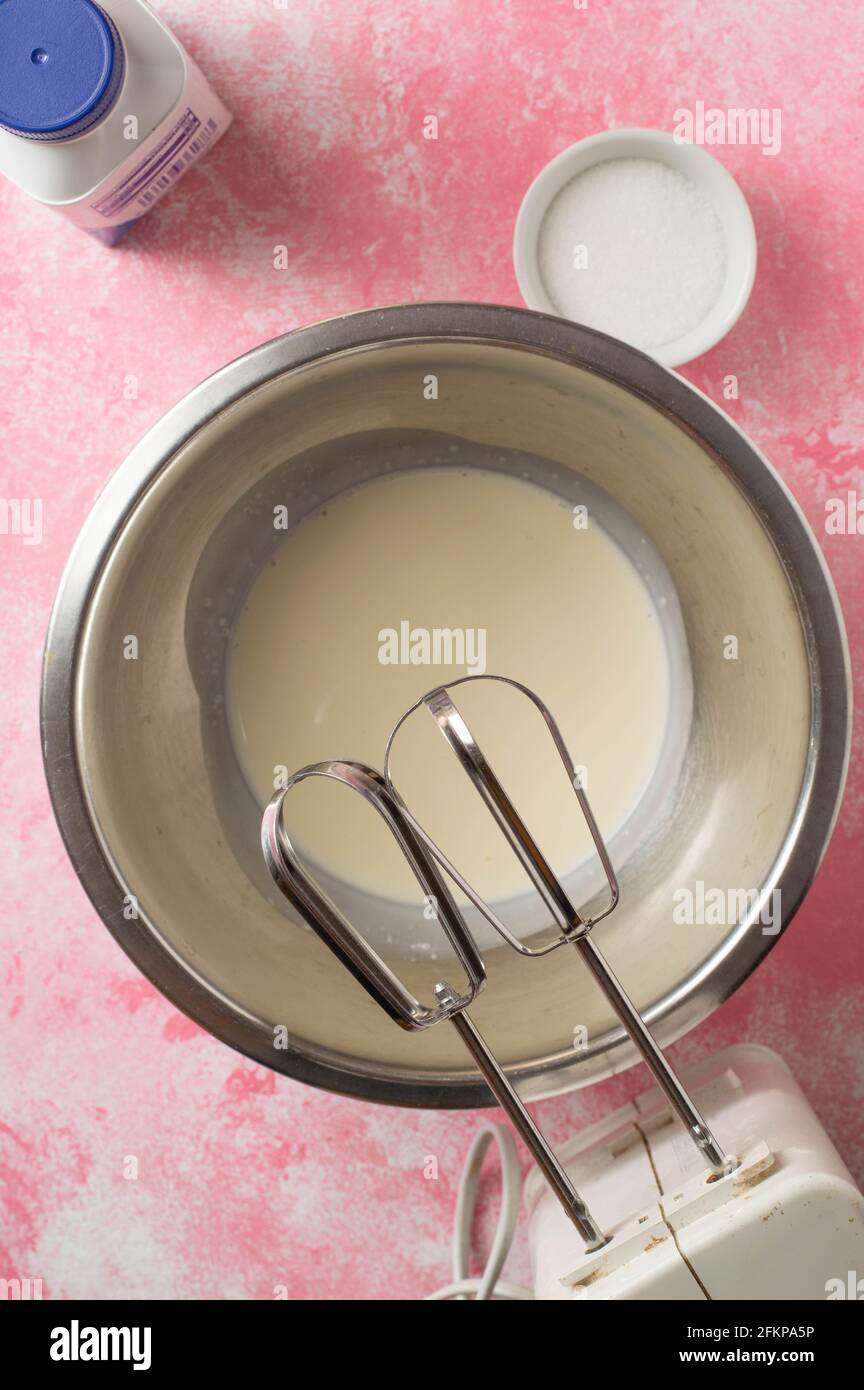 A bowl full of whipped cream Stock Photo Alamy