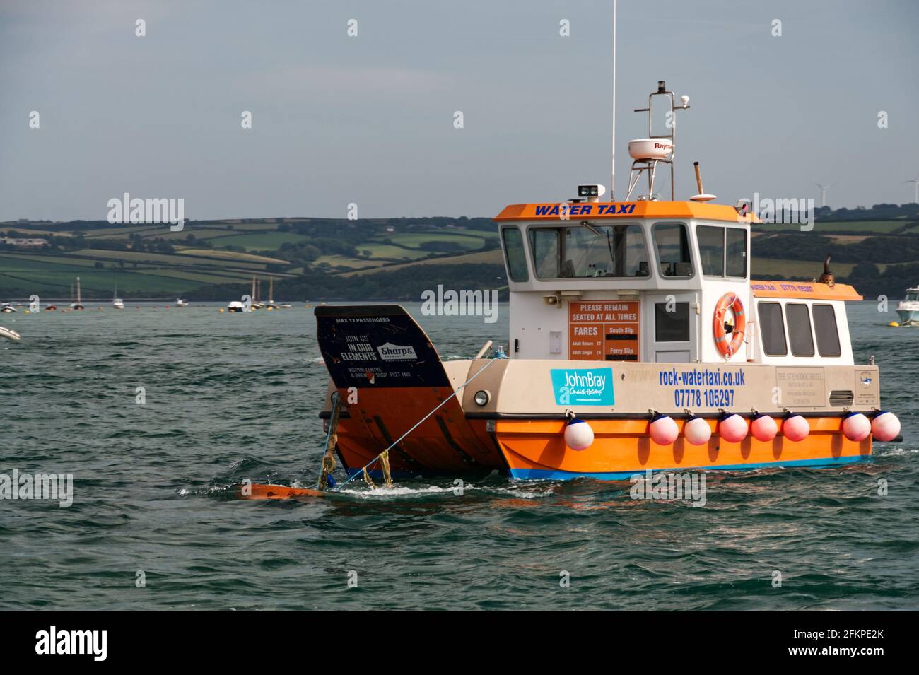 Passenger Ferry running from Padstow to Rock across the Camel estuary on the Cornish coastline. Stock Photo