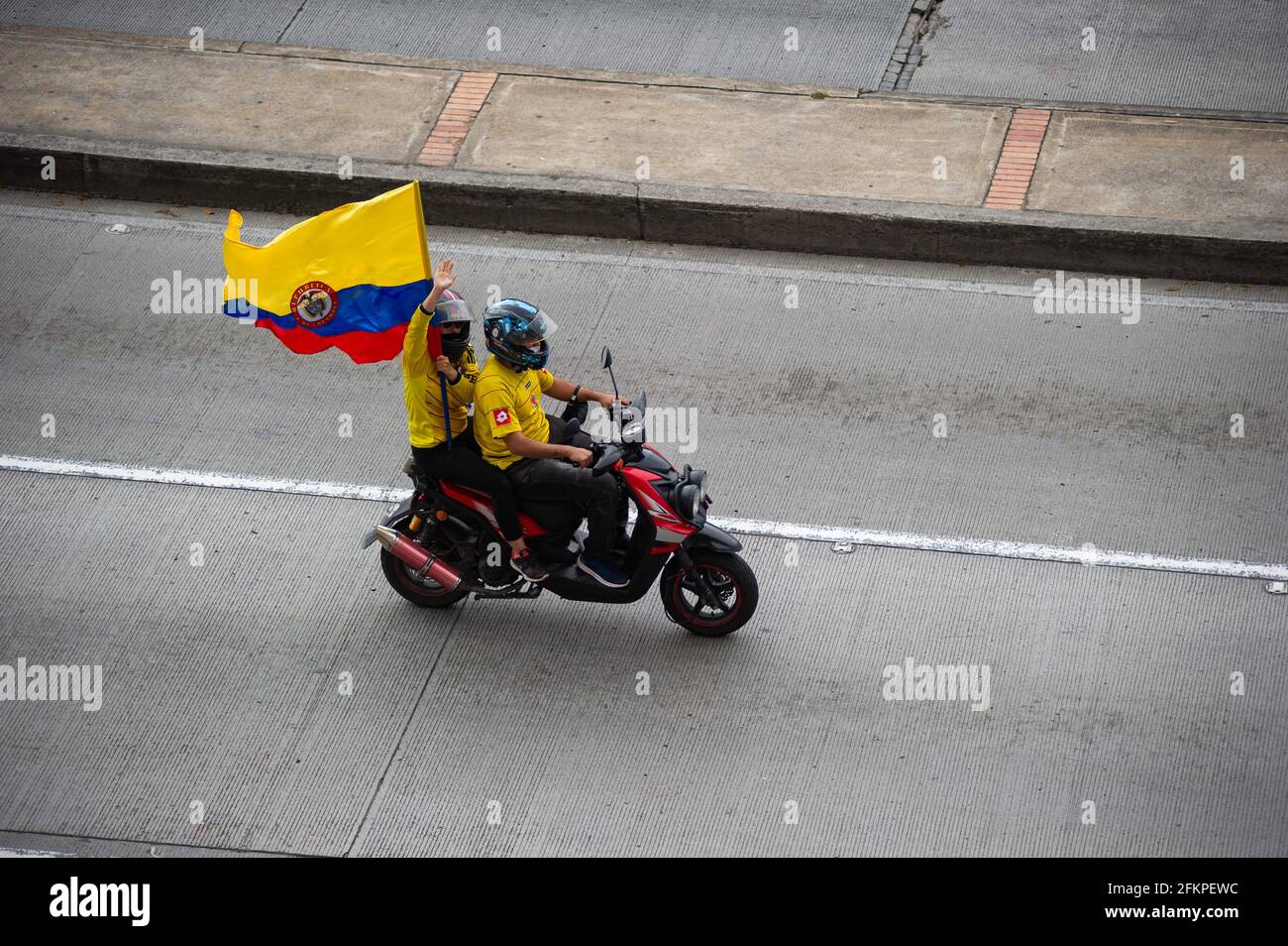 Bogota, Cundinamarca, Colombia. 2nd May, 2021. Bikers with Colombian Flags, flood streets of Bogota to celebrate the withdraw of the tax reform of President Ivan Duque, in Bogota, Colombia on May 2, 2021. Credit: Sebastian Barros/LongVisual/ZUMA Wire/Alamy Live News Stock Photo