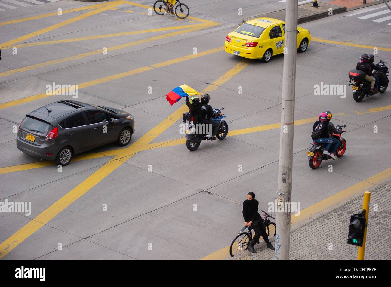 Bogota, Cundinamarca, Colombia. 2nd May, 2021. Bikers with Colombian Flags, flood streets of Bogota to celebrate the withdraw of the tax reform of President Ivan Duque, in Bogota, Colombia on May 2, 2021. Credit: Sebastian Barros/LongVisual/ZUMA Wire/Alamy Live News Stock Photo
