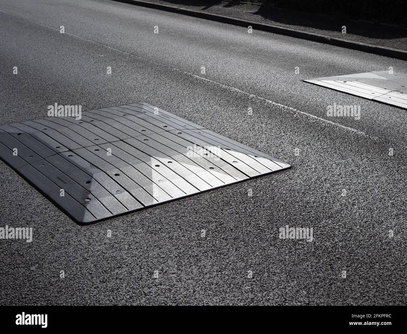 strong graphic closeup of road speed bumps Stock Photo Alamy