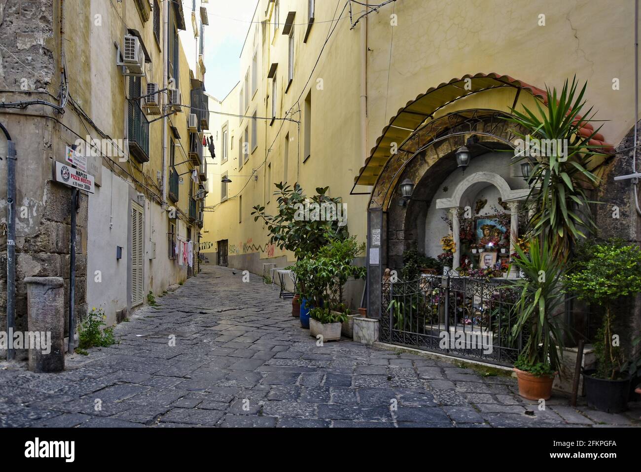 Naples, Italy, May 2, 2021. A place of prayer and religious devotion in a street of the medieval quarter. Stock Photo