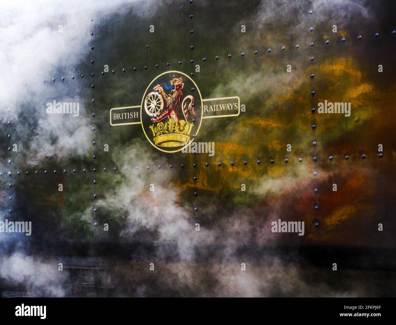 Steam swirling around a Steam Locomotive Stock Photo