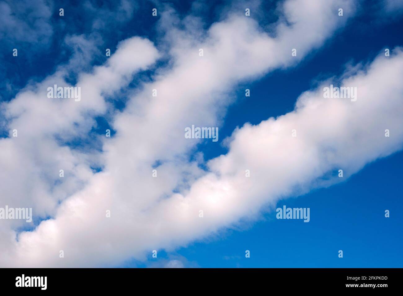 Billow altocumulus low level clouds in blue sky Stock Photo
