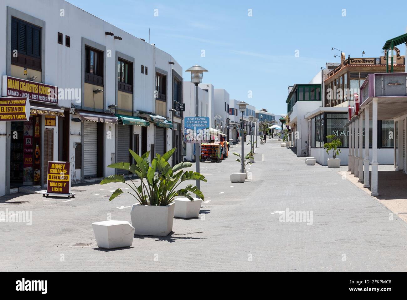 Playa Blanca, Spain; April 28th 2021: Empty touristic shopping street during pandemic in Lanzarote island, Canary Islands Stock Photo