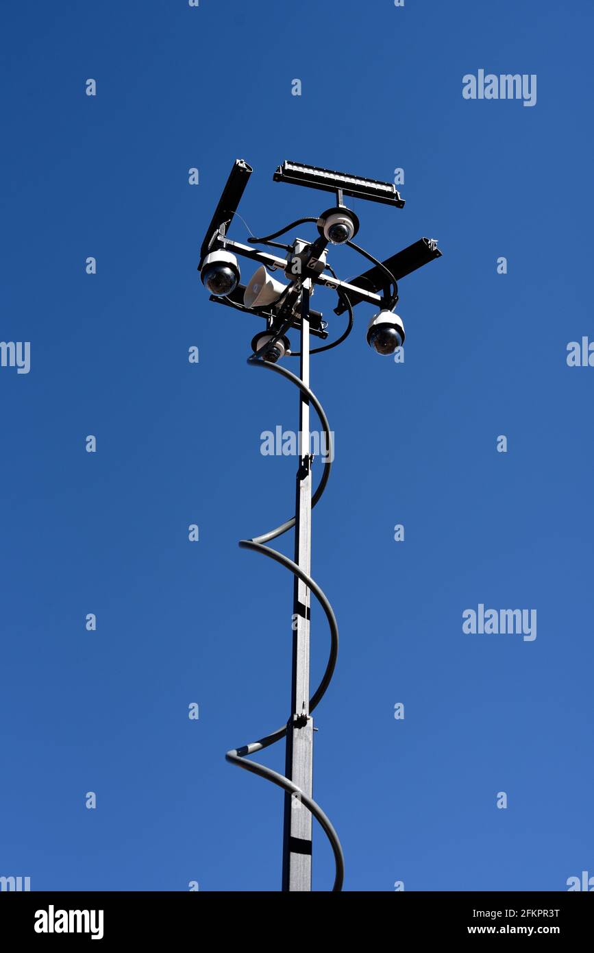 A surveillance tower with cameras set up by the police department in