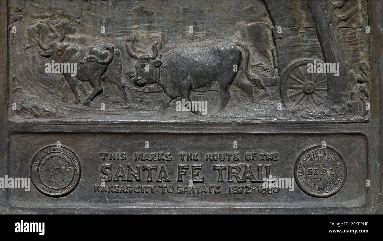 A metal plaque marks the end of the historic 19th century Santa Fe Trail which brought settlers and explorers from Missouri to Santa Fe, New Mexico. Stock Photo