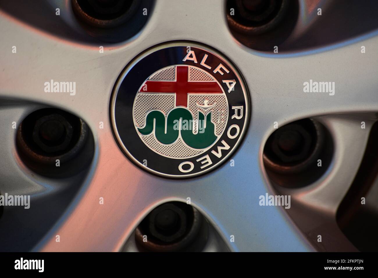The Alfa Romeo logo on the wheel cover of an Alfa Romeo SUV in Santa Fe,  New Mexico Stock Photo - Alamy