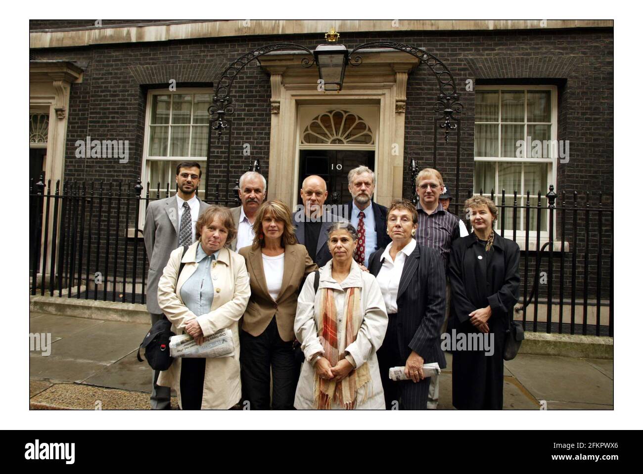 Julie Cristie and brian Eno deliver a letter to downing st against the continuing war in Iraqpic David Sandison 15/9/2005 Stock Photo