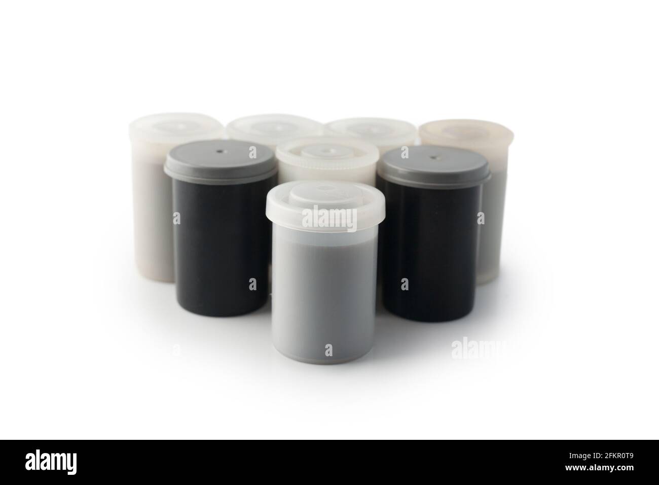 Plastic canister for a film 35mm roll isolated on white background