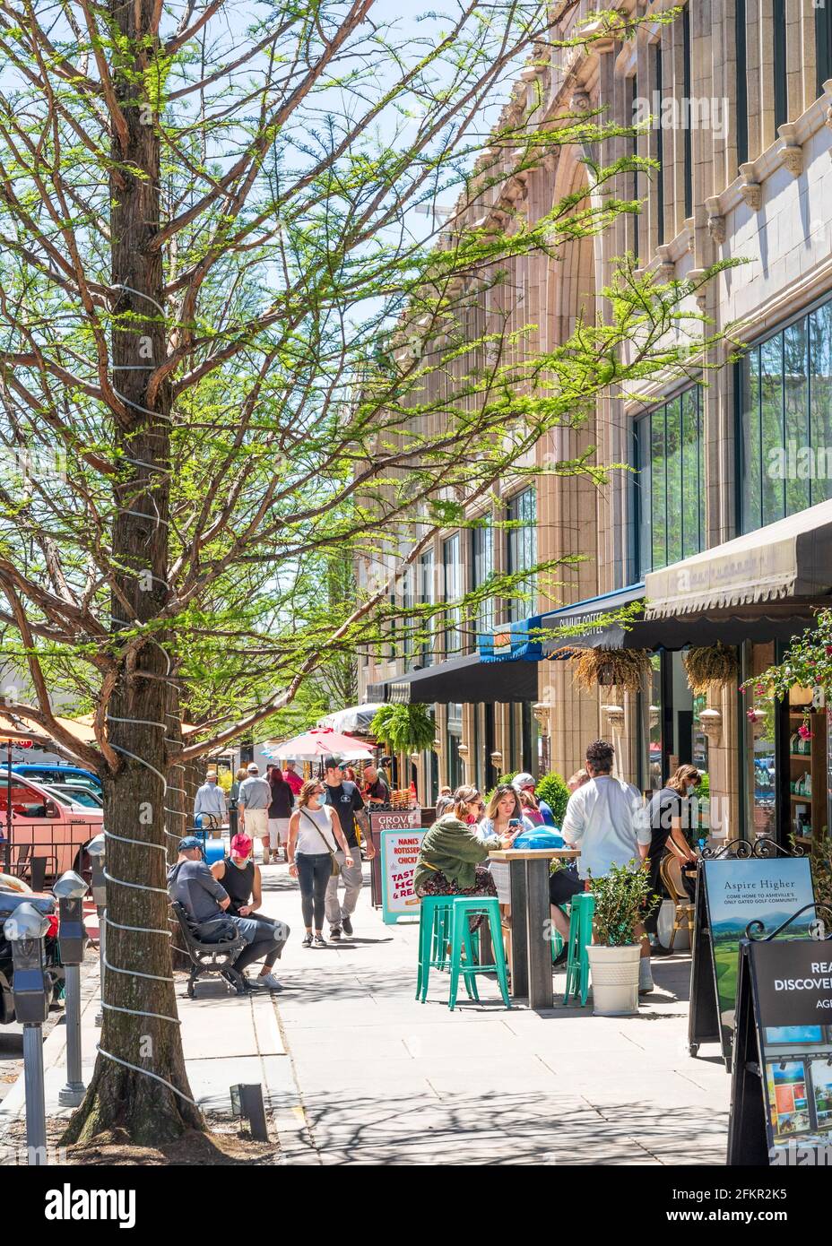 ASHEVILLE, NC, USA-1 MAY 2021: Diners and shoppers on Page Ave. in ...