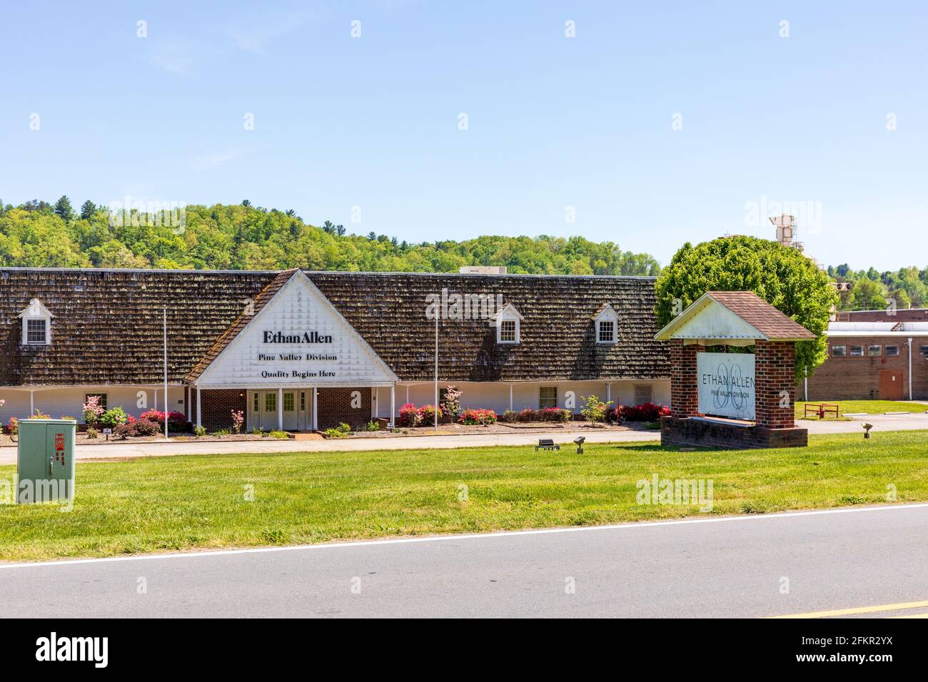 OLD FORT, NC, USA-1 MAY 2021: The Pine Valley Division of Ethan Allen Furniture manufacturing and distribution.  Old Highway 70. Sunny, spring day. Stock Photo
