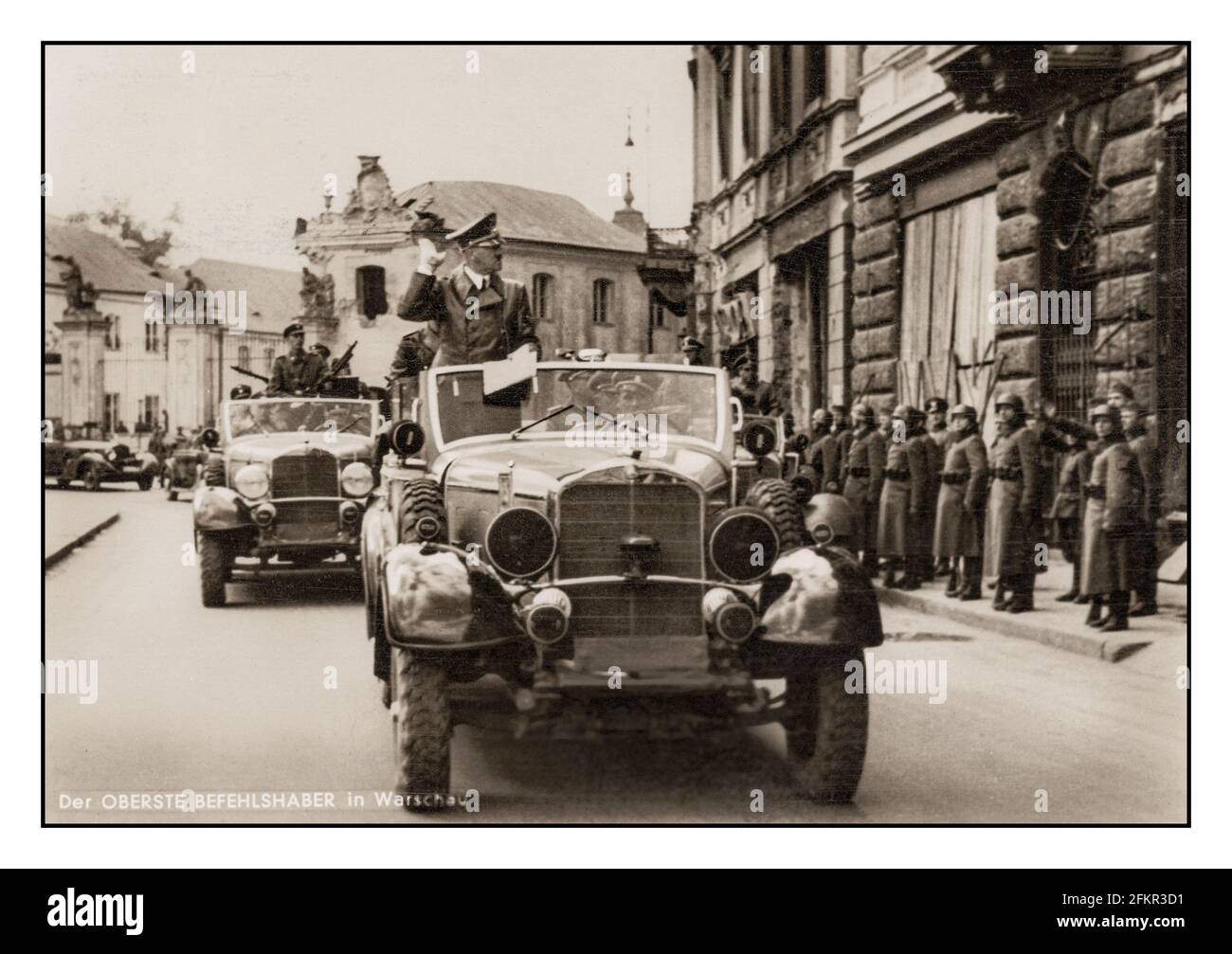Adolf Hitler in Warsaw parade saluting Wehrmacht Troops occupying Poland 1940  by Hofmann Studios  Titled DER OBERSTE BEFEHLSHABER'  'THE SUPREME IN COMMAND '' Stock Photo