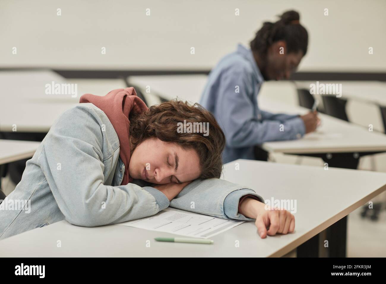 College Students In Class Sleeping