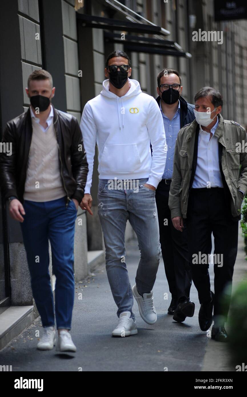 Milan, Zlatan Ibrahimovic at lunch in the center Zlatan Ibrahimovic, striker of MILAN and the SWEDEN national team, could play the 2021 European Championships that will start in June. Here he is surprised while having lunch with Ignazio Abate (former Milan defender) and 2 friends in a famous restaurant in the center. At the exit he gives some souvenir photos with some fans, then he goes back home. Stock Photo