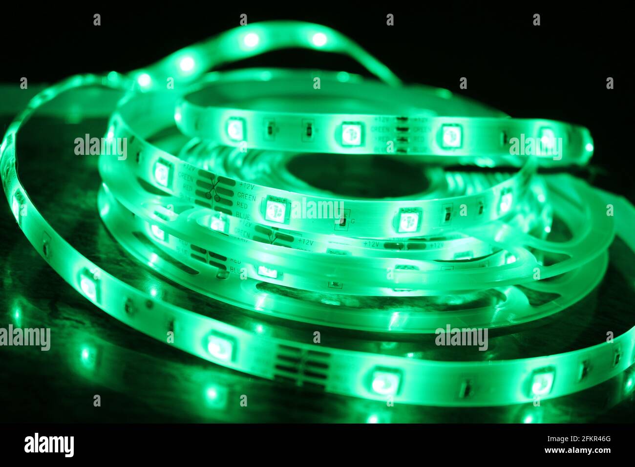 Led strip in operation generating suggestive luminous and colored ...