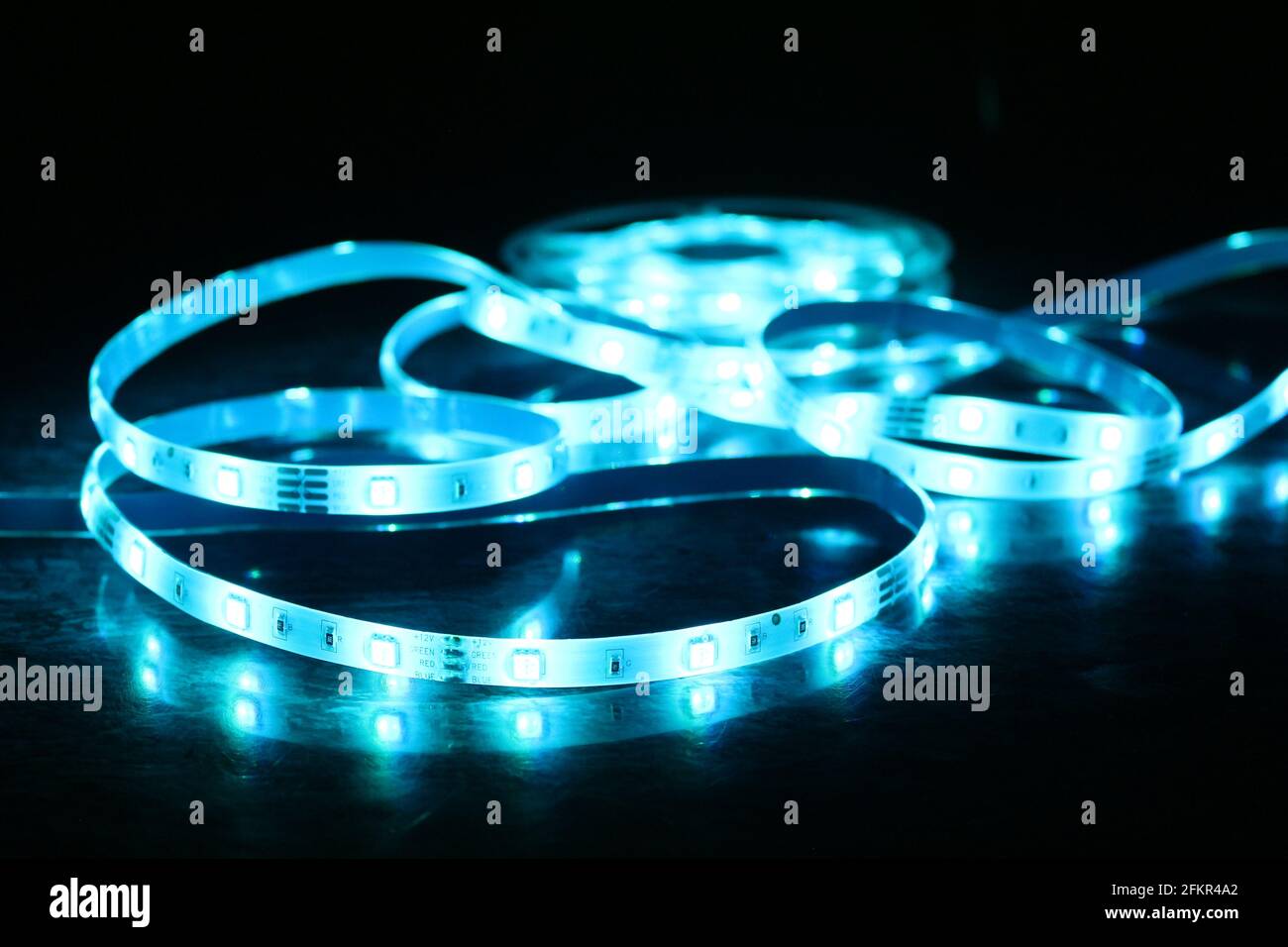 Led strip in operation generating suggestive luminous and colored ...