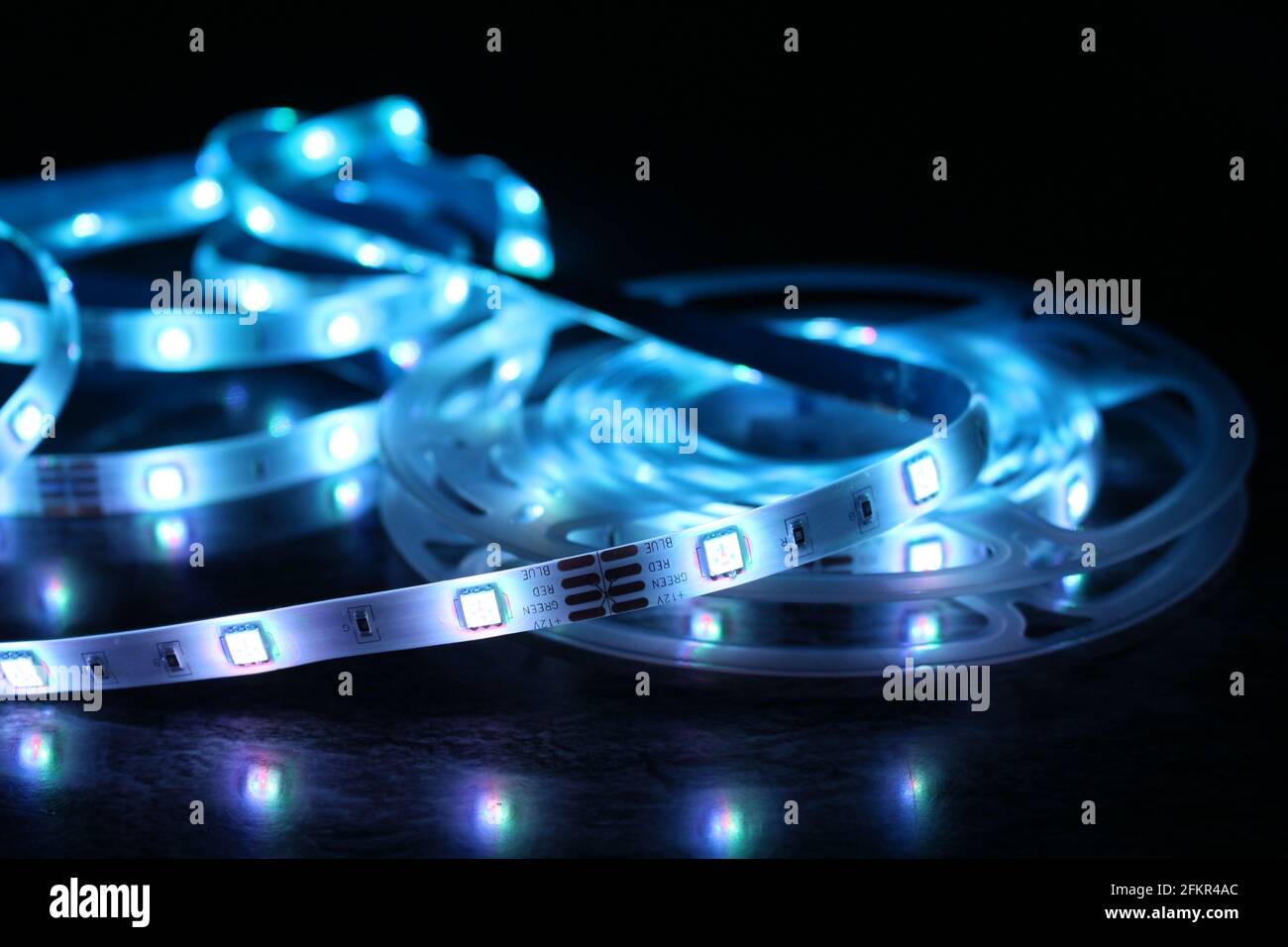 Led strip in operation generating suggestive luminous and colored ...