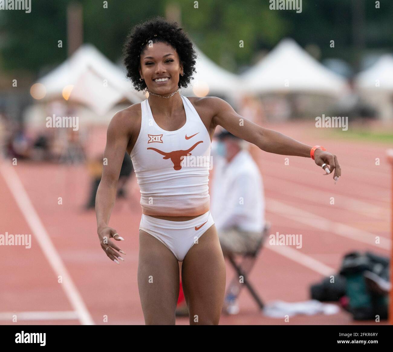 Austin, Texas, USA. 01st May, 2021. University of Texas women's long jump ace Tara Davis smiles after an easy victory at the Texas Invitational as she continues a quest for a spot on the 2021 U.S. Olympic team. Credit: Bob Daemmrich/Alamy Live News Credit: Bob Daemmrich/Alamy Live News Stock Photo