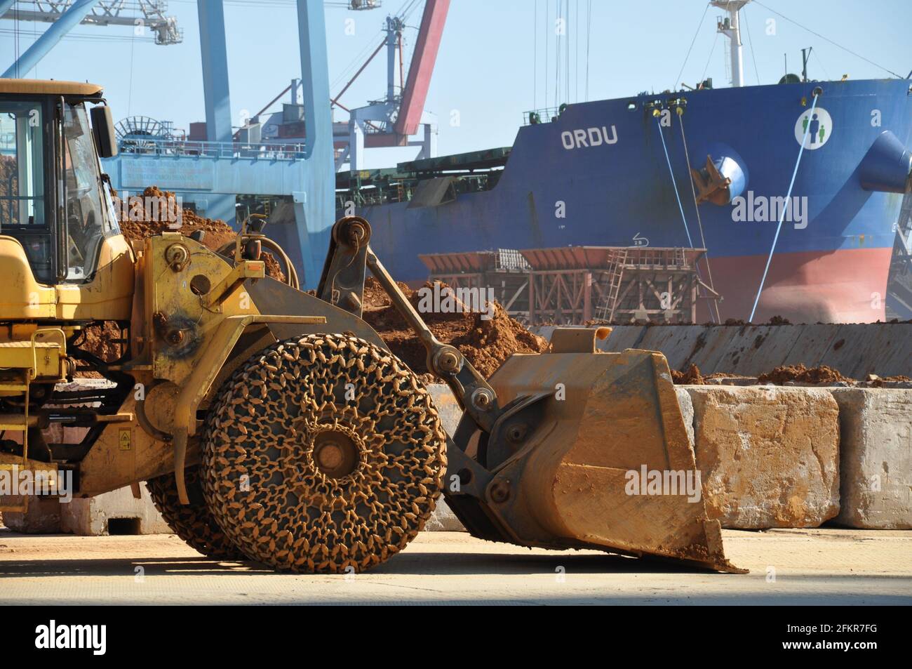 Construction machine excavator with chained wheel and dirty bulldozer