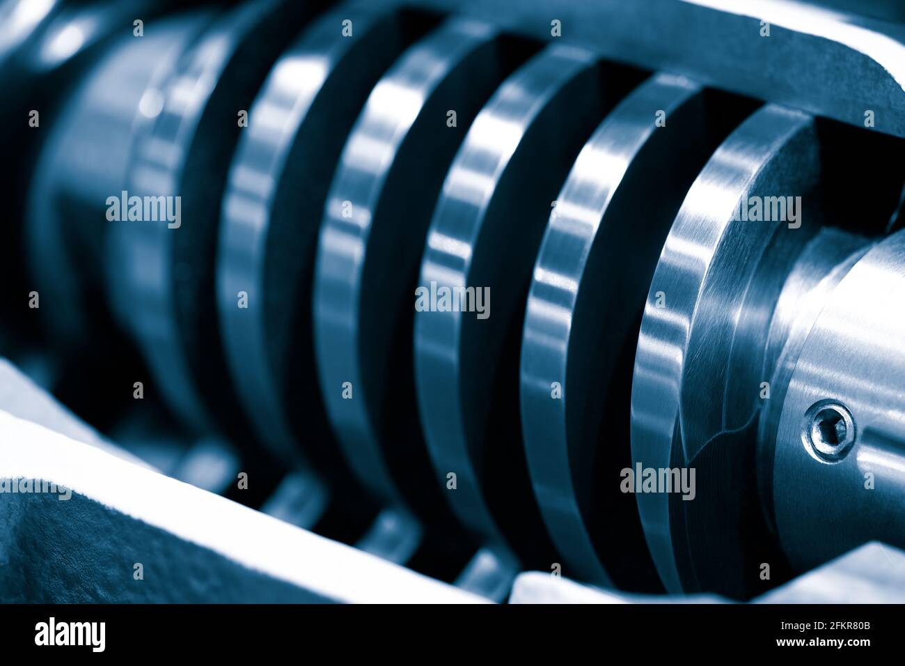 Close up gears of screw compressor. Pneumatic unit. Device for