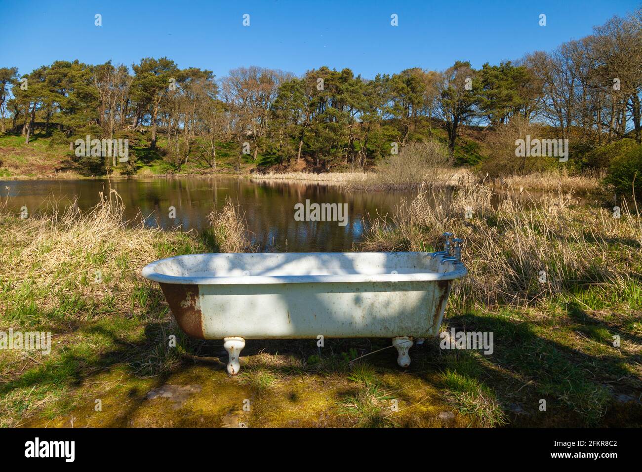 Bathtub placed in countryside and used as spring water trough, exilles,  Italy Stock Photo - Alamy