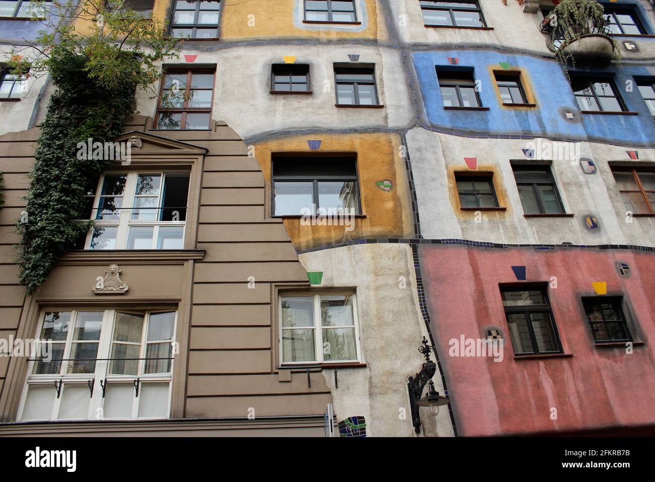 Hundertwasserhaus is an apartment house in Vienna, Austria. Hodgepodge building with eclectic mash up facade Stock Photo