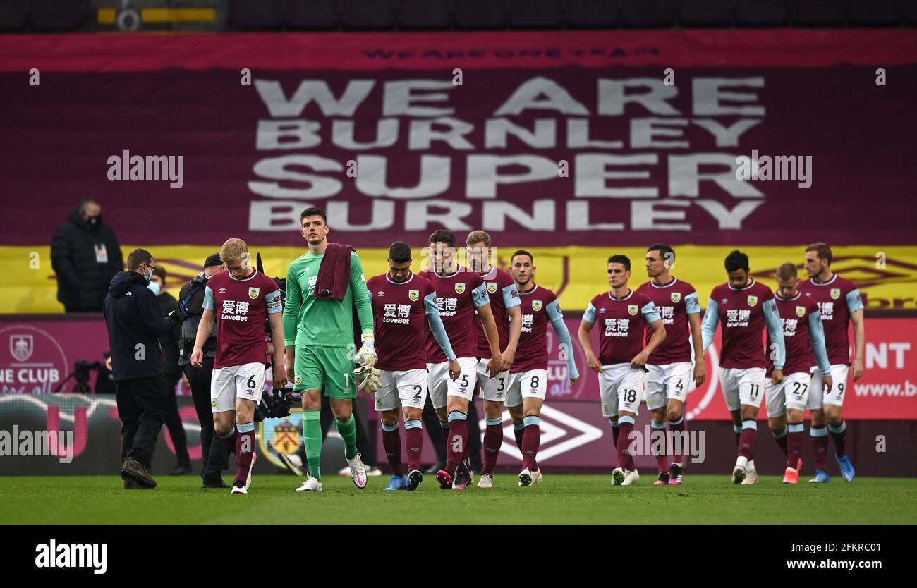 Burnley players walk out for the match before the Premier League match at Tuff Moor, Burnley. Issue date: Monday May 3, 2021. Stock Photo