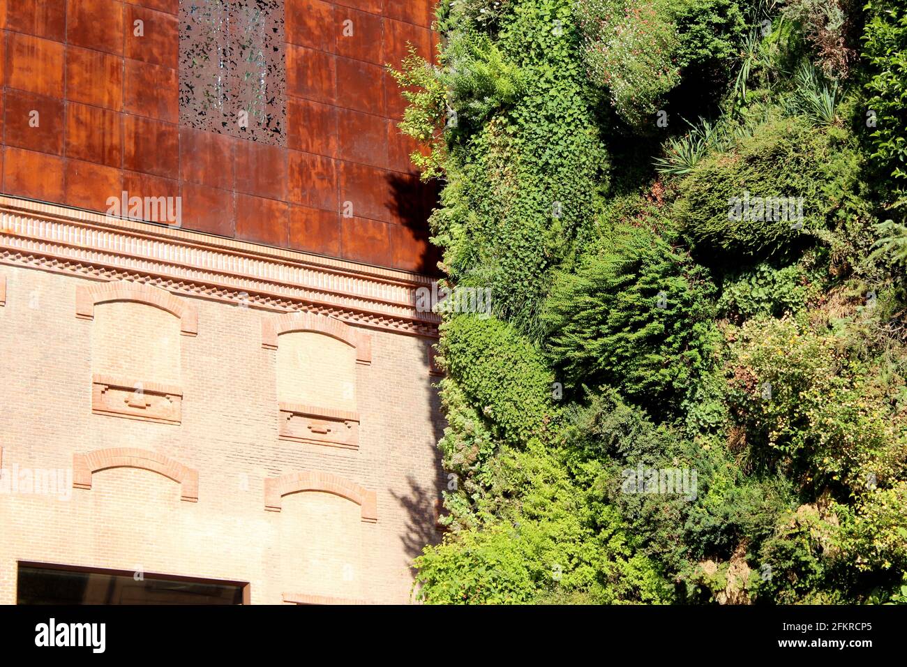 Old meets new with this adaptive reuse project. CaixaForum in Madrid, Spain. Stock Photo