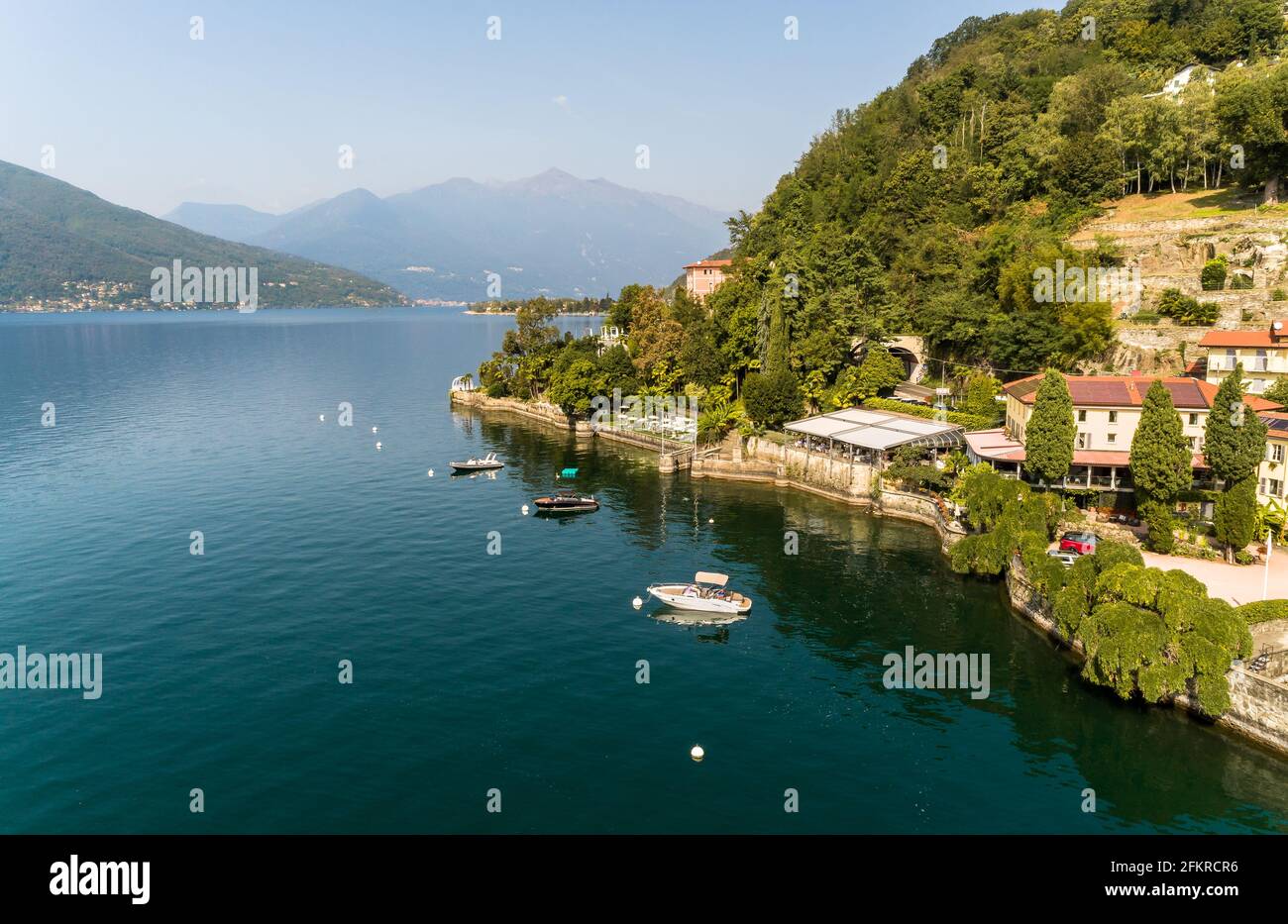 Aerial landscape of Lake Maggiore in a sunny day from the Colmegna lakeside, municipality of Luino, Italy Stock Photo