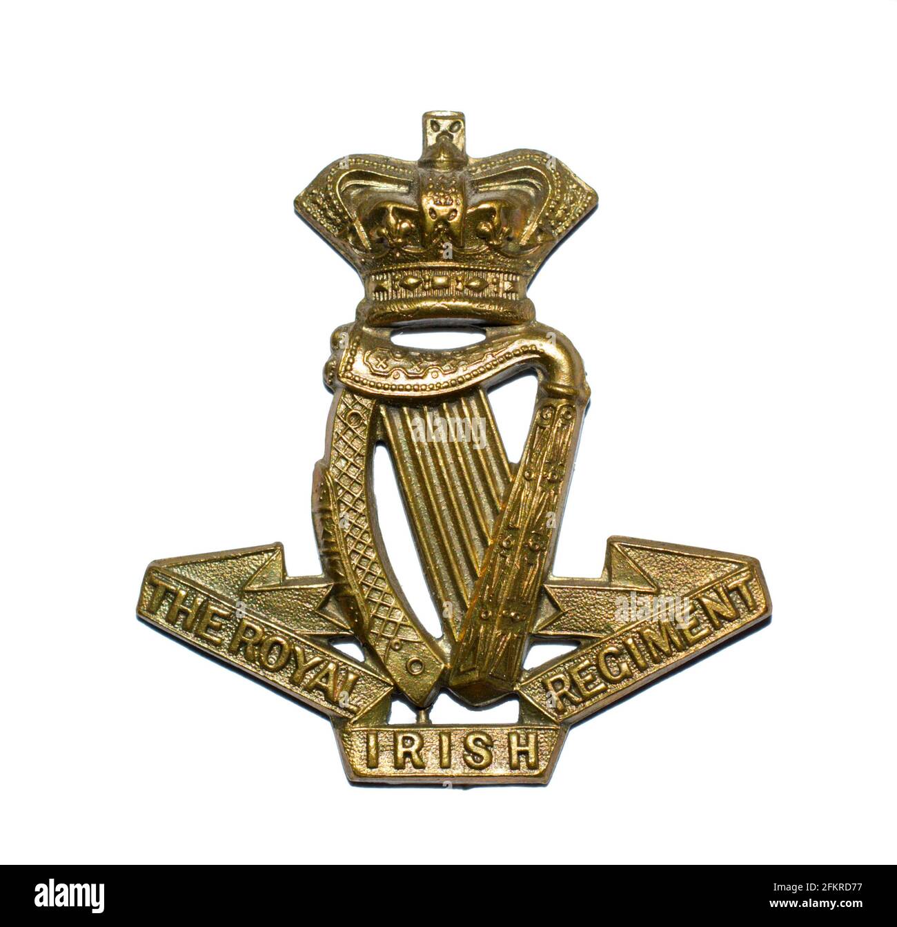 A cap badge of The Royal Irish Regiment , with Queen Victorias crown pre 1901. Stock Photo