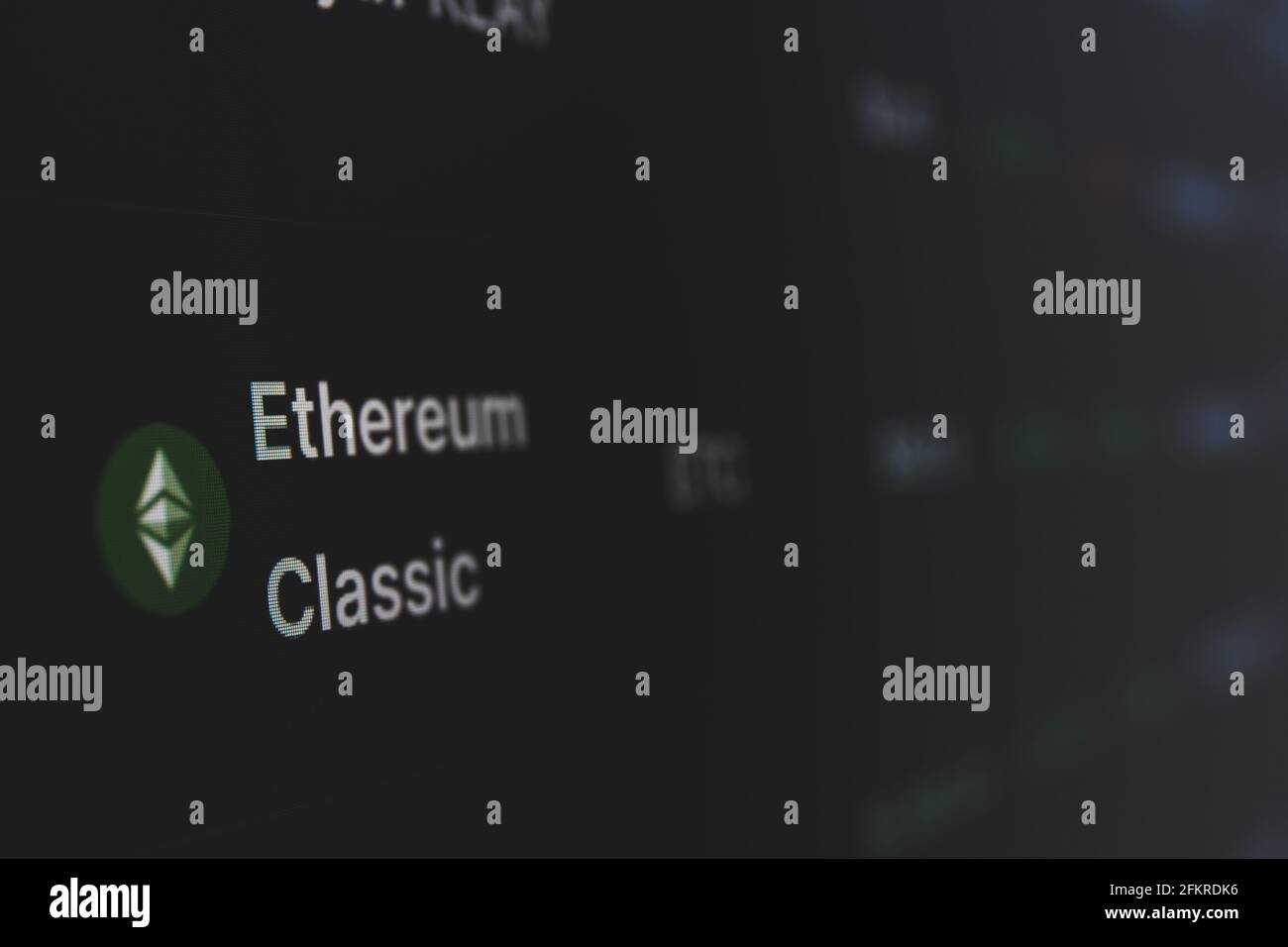 Ethereum classic on cryptocurrency exchange market . A cryptocurrency is a digital or virtual currency that uses cryptography for security Stock Photo