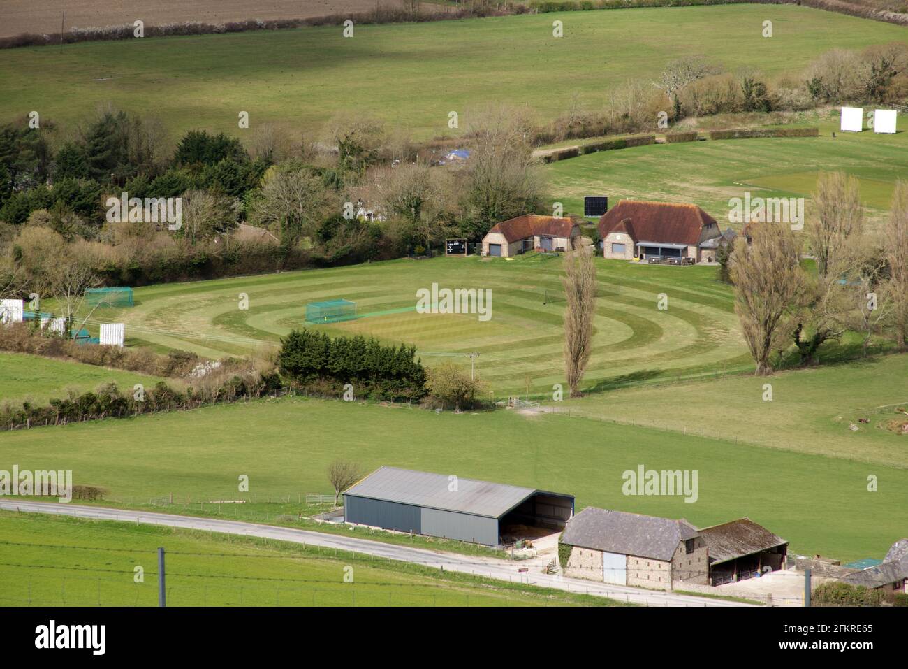 A view of Preston Nomads Cricket Club in Fulking seen from Devils Dyke in Sussex, England, UK Stock Photo