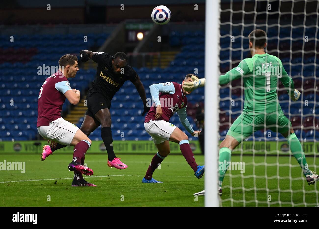 West Ham United's Michail Antonio scores their first goal of the game during the Premier League match at Tuff Moor, Burnley. Issue date: Monday May 3, 2021. Stock Photo