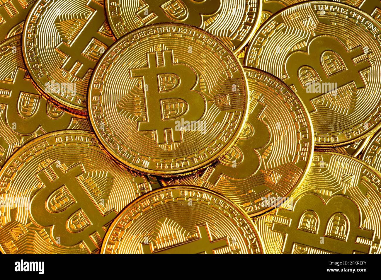 Bitcoin pile background, digital crypto currency bitcoin close-up. Many of gold bit coins as virtual money, btc. Concept of online bitcoin payment, mi Stock Photo