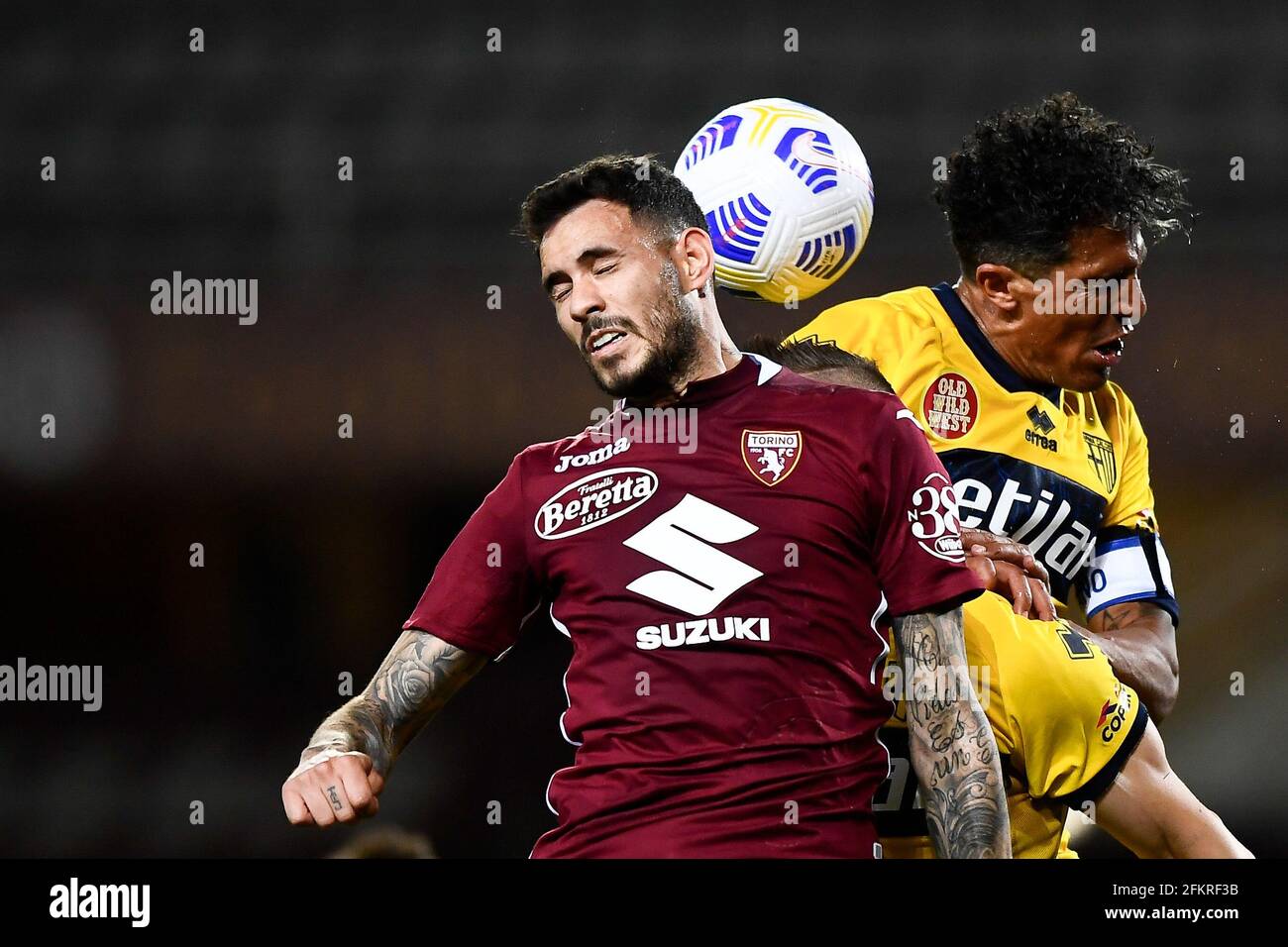 Turin, Italy. 03 May 2021. Antonio Sanabria (L) of Torino FC competes for a header with Bruno Alves of Parma Calcio during the Serie A football match between Torino FC and Parma Calcio. Credit: Nicolò Campo/Alamy Live News Stock Photo