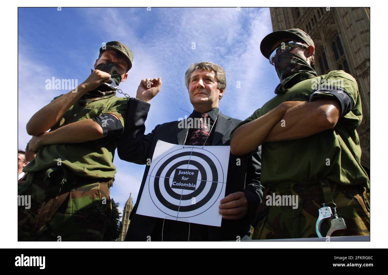 Justice for Colombia........Trade Union Leaders, a former minister and MPs demonstrate outside Parliament in protest against the UK Governments continued military assistance to Colombia.Tony Lloyd (former Foreign Office Minister) pic David Sandison 10/7/2003 Stock Photo